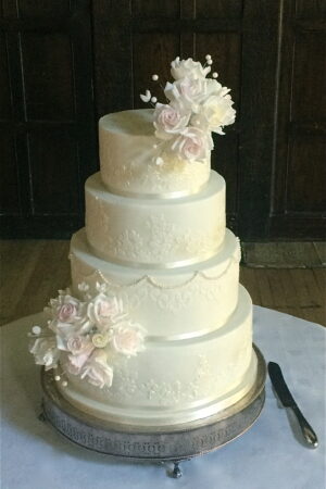 Sugar rose & pearl sprays with Alencon lace at Great Fosters