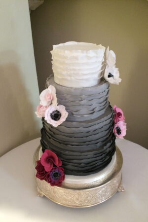 Grey Ombre Ruffle Cake with Ombre Sugar Roses, Orchids & Peonies at Farnham Castle